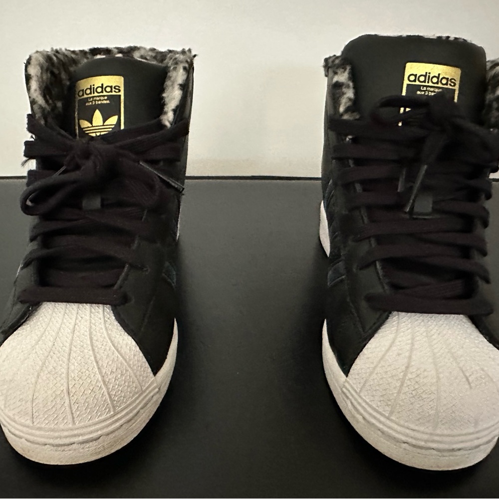 Adidas Black and leopard fur lining